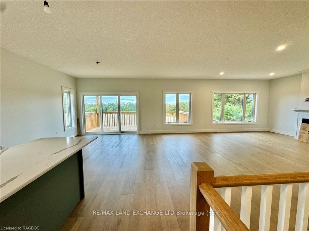 Open concept living, dining area and kitchen