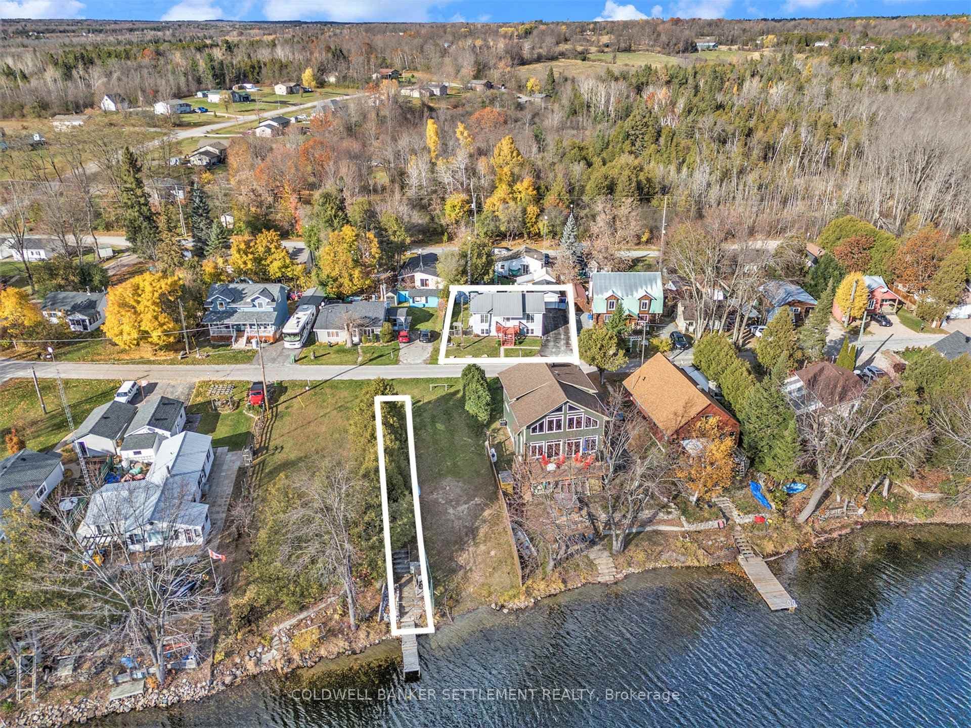House & Waterfront Lot (lot lines are approximate)