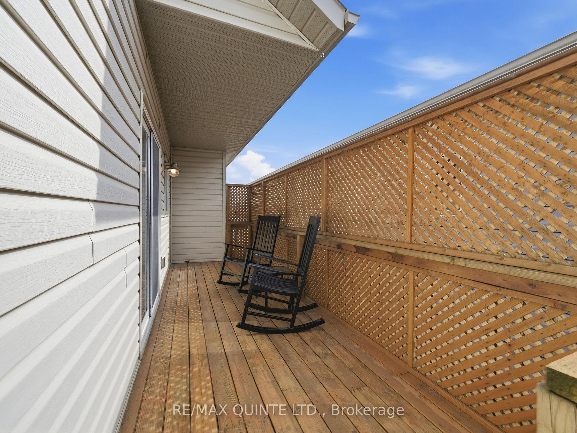 Side deck, space for barbecue and seating.