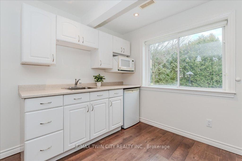 Kitchenette with bar fridge and microwave