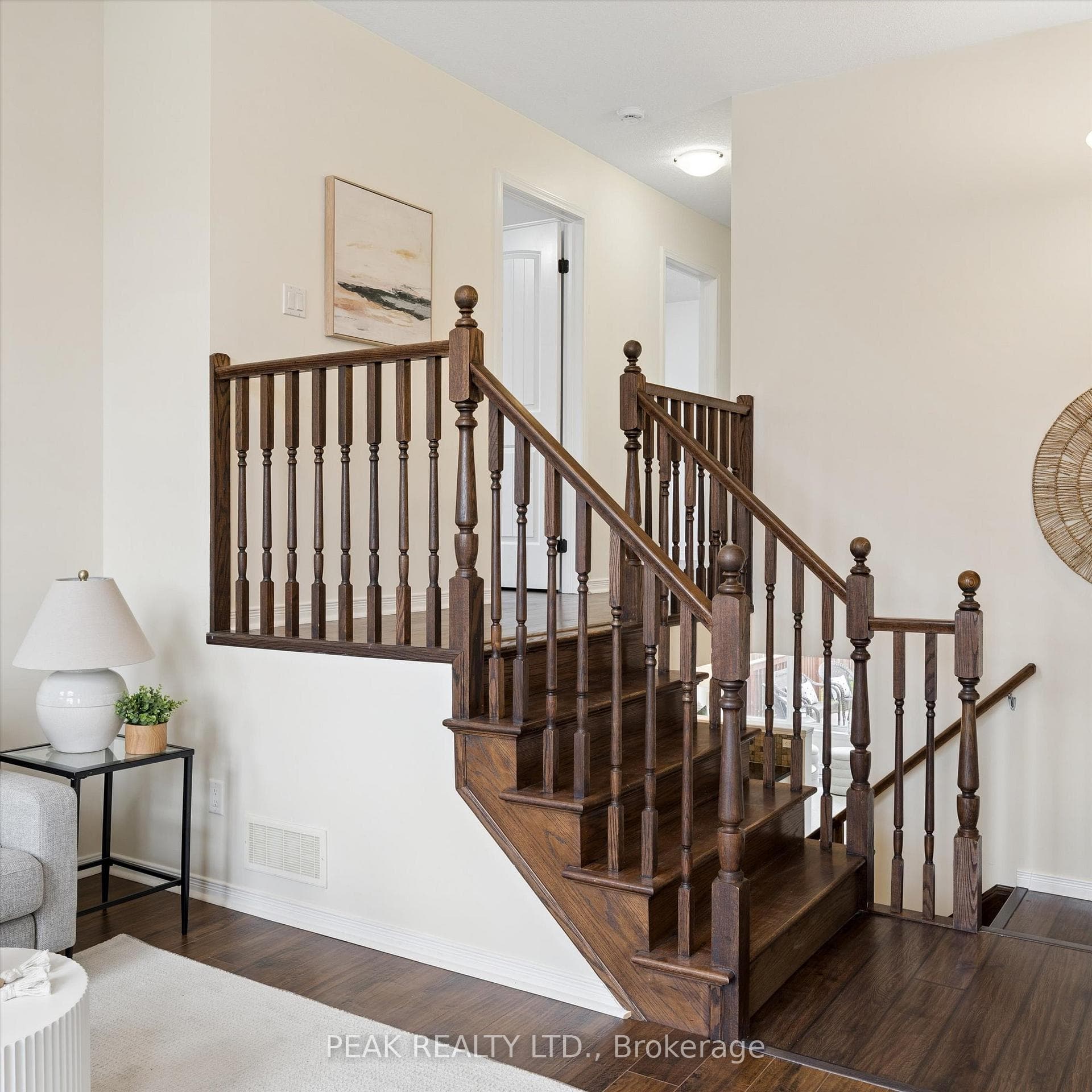 Hardwood stairs leading to Bedroom floor.