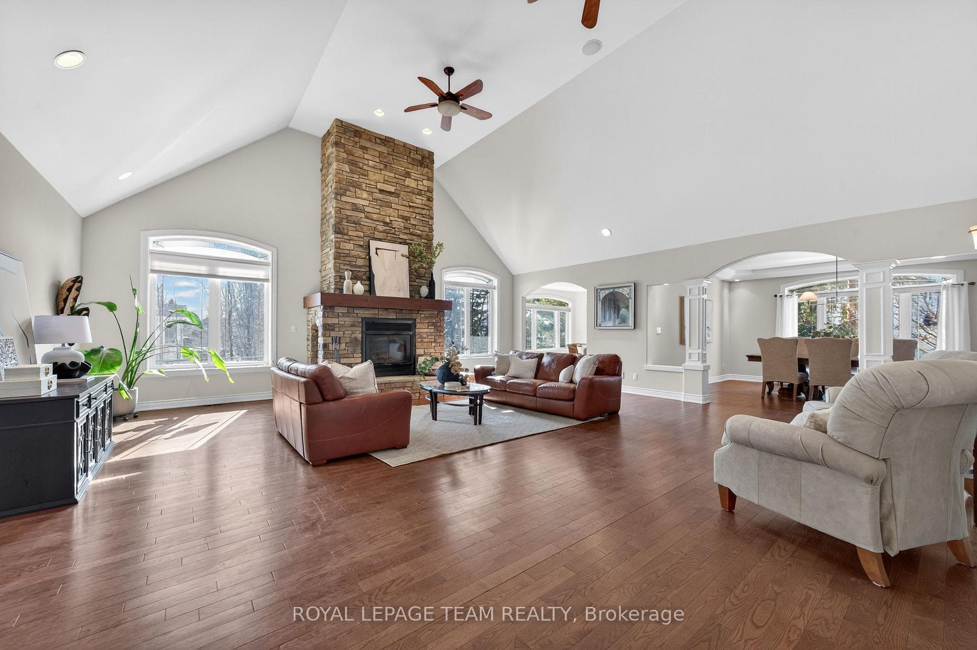Sun-filled great room and brick fireplace