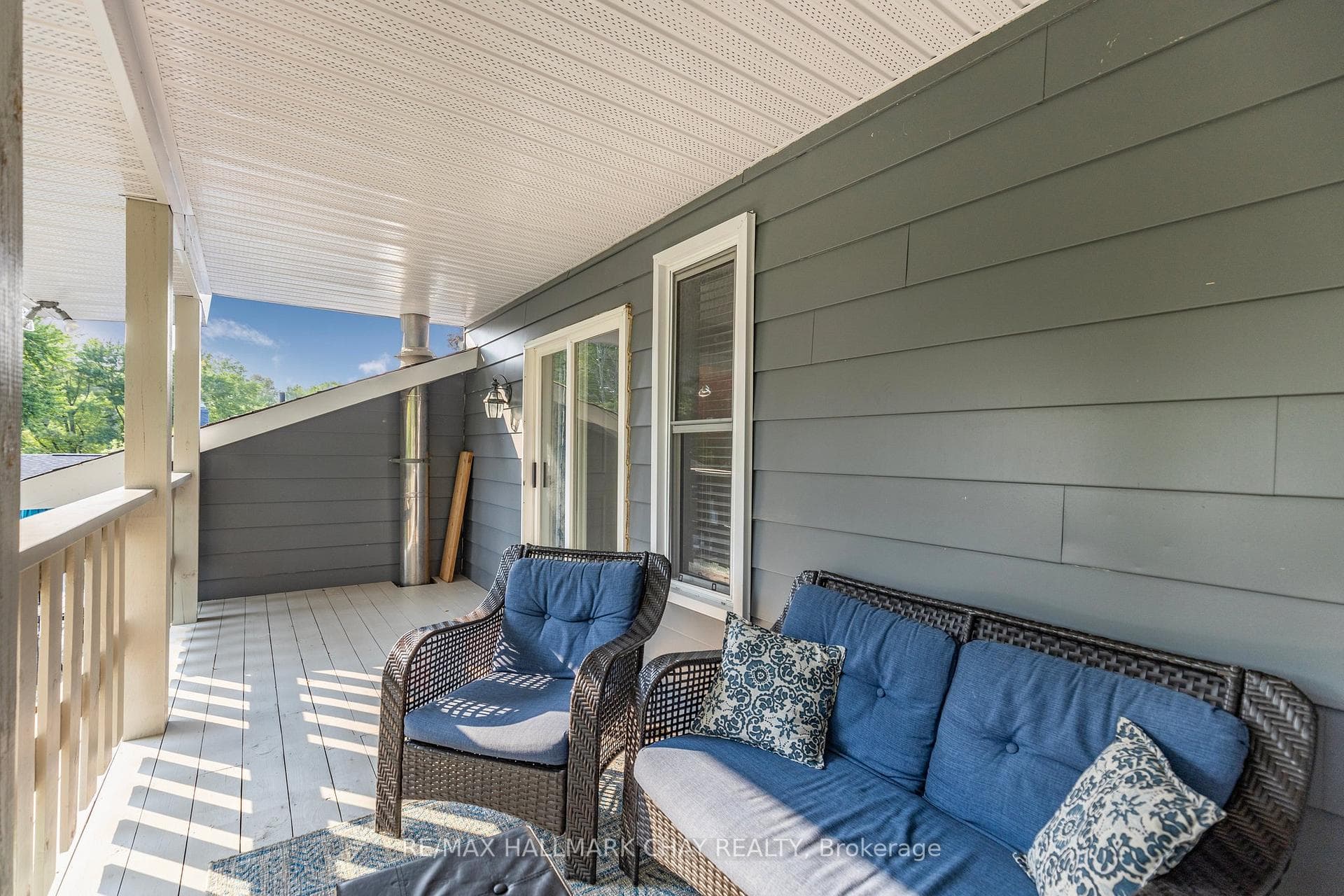 Covered porch off primary bedroom