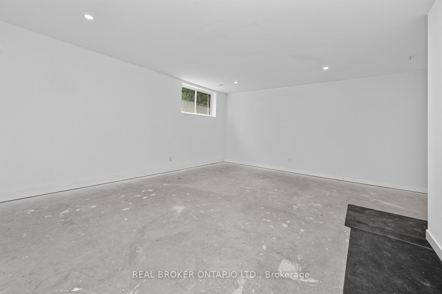 PARTIALLY FINISHED REC ROOM BASEMENT