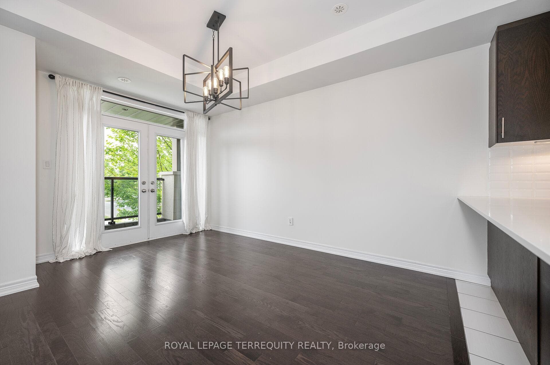 Dining Room with Walk Out to 1 Of 2 Balconies