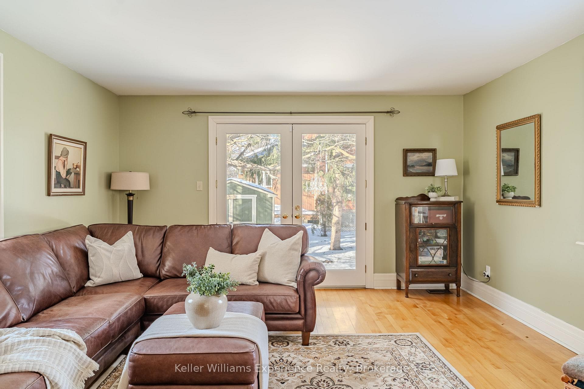 Cozy family room with French doors to the gardens