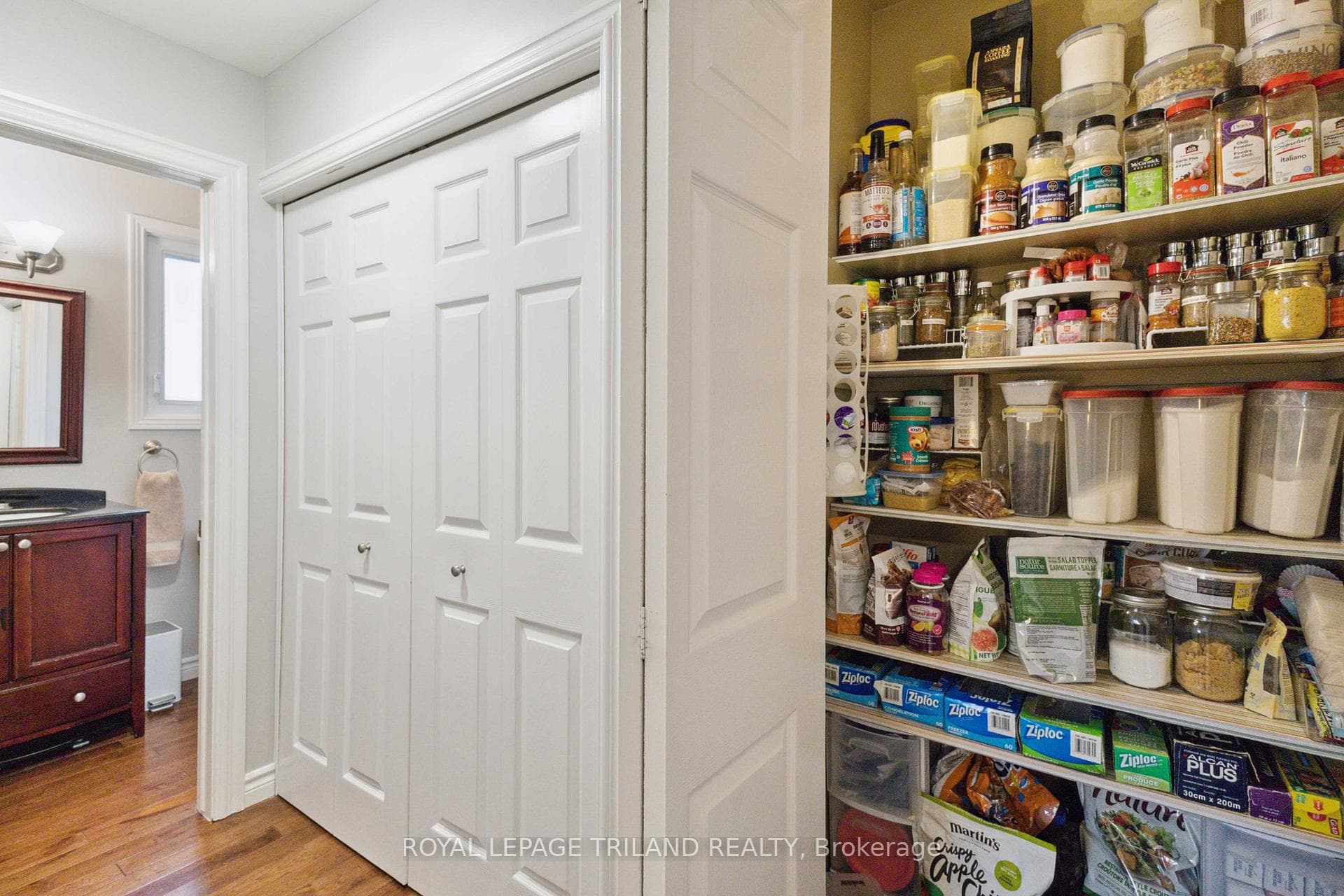 Main floor pantry/laundry closet/powder room