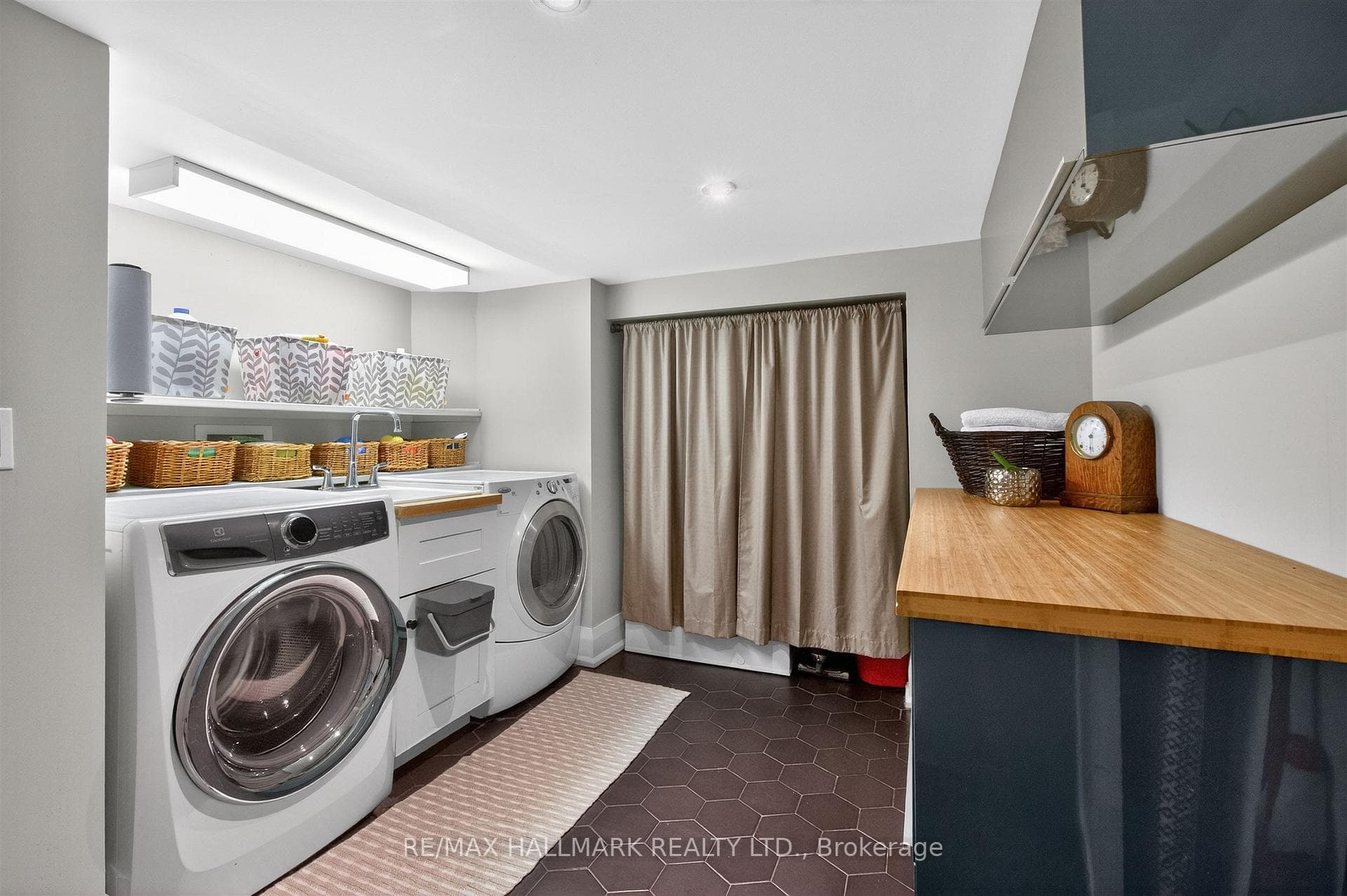 Laundry area with folding areas and storage