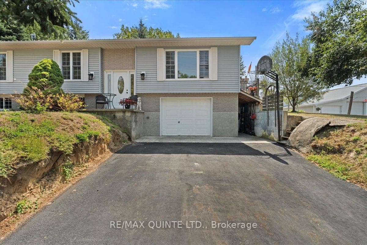 newly paved driveway to garage