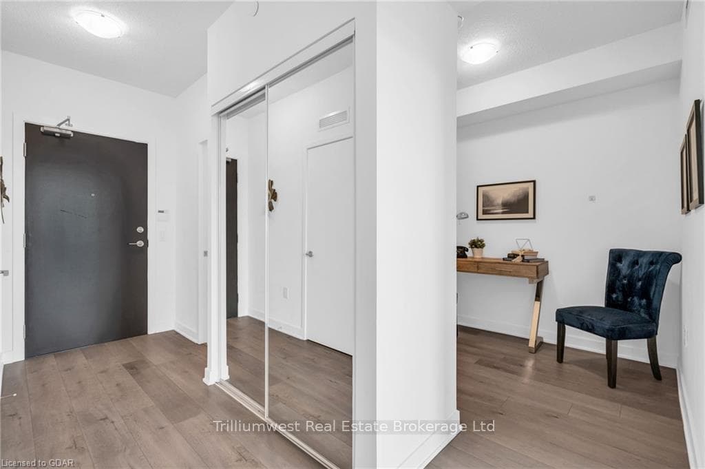 Corridor with light wood-type flooring