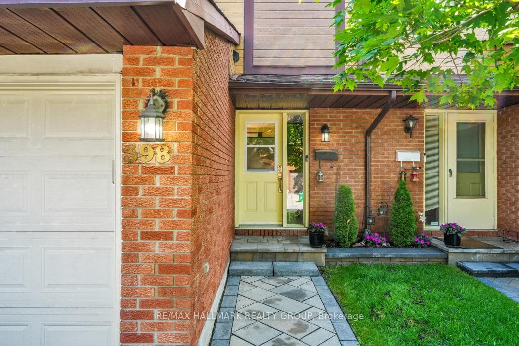 Interlock walkway to pretty front door.