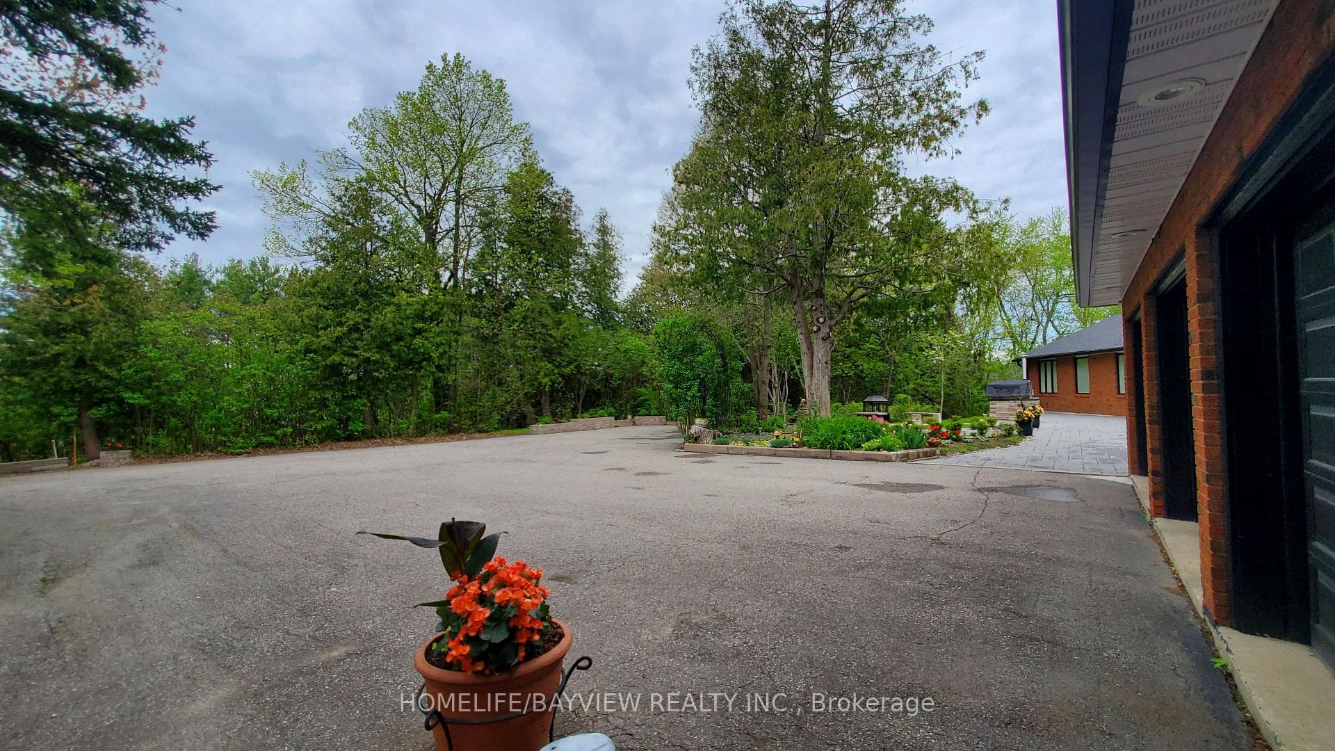 Front yard parking area from first garage