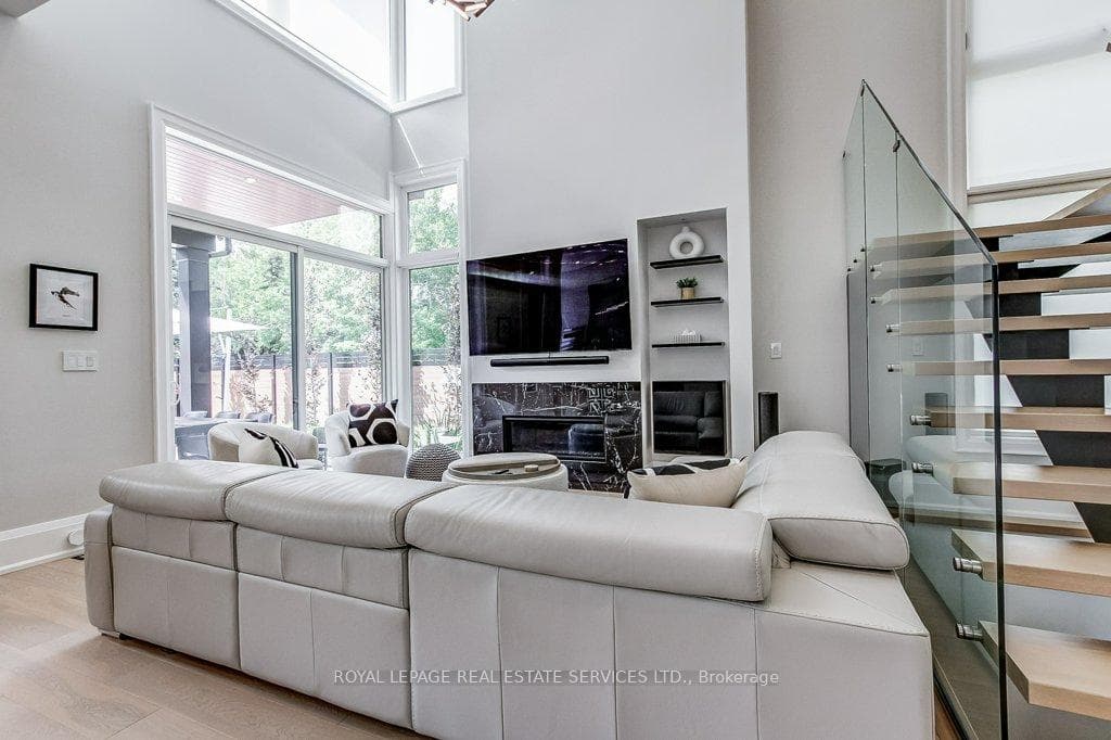 Living room open to Kitchen overlooking rear yard