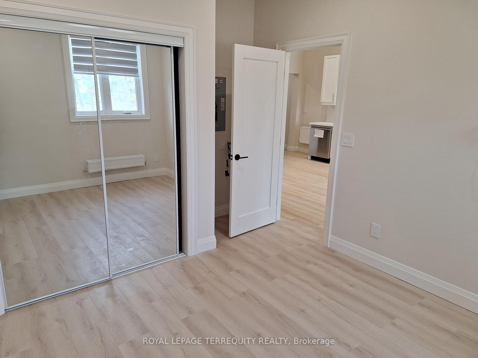 Bedroom with Double Mirrored Closet