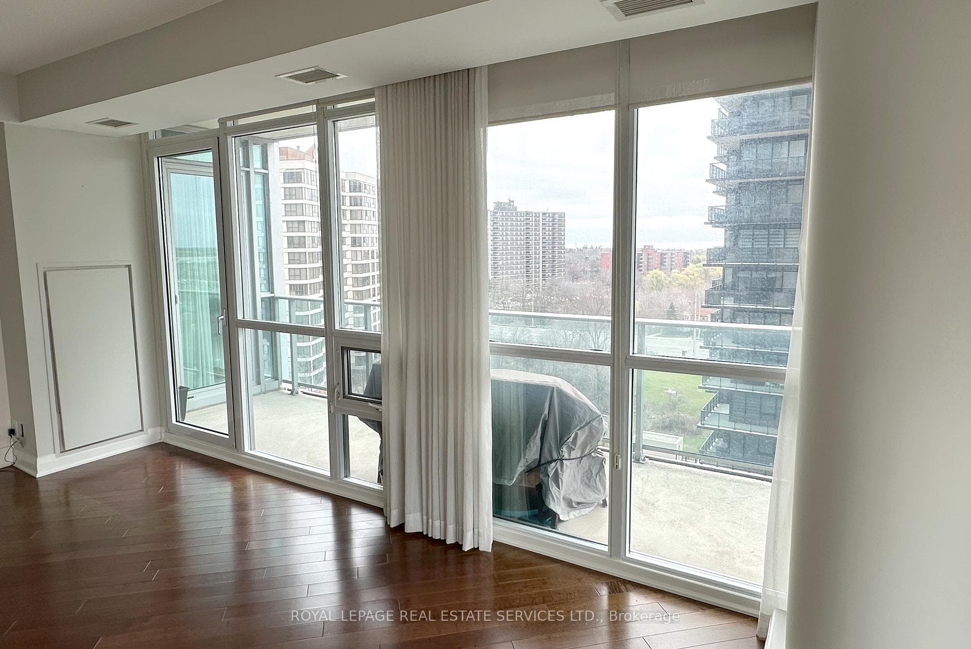 Living Rm facing S/E. Floor to ceiling windows