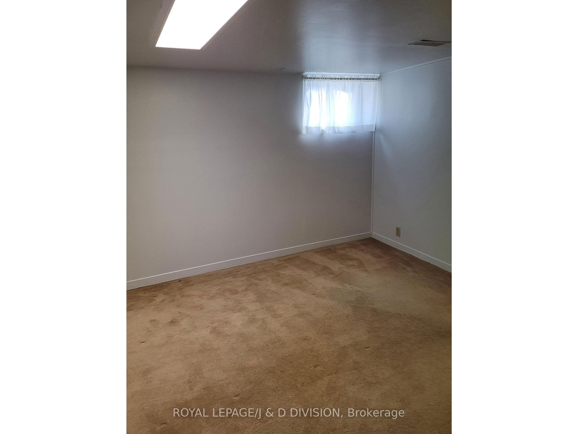 Two windows in bedroom and 6' 6" ceiling height.