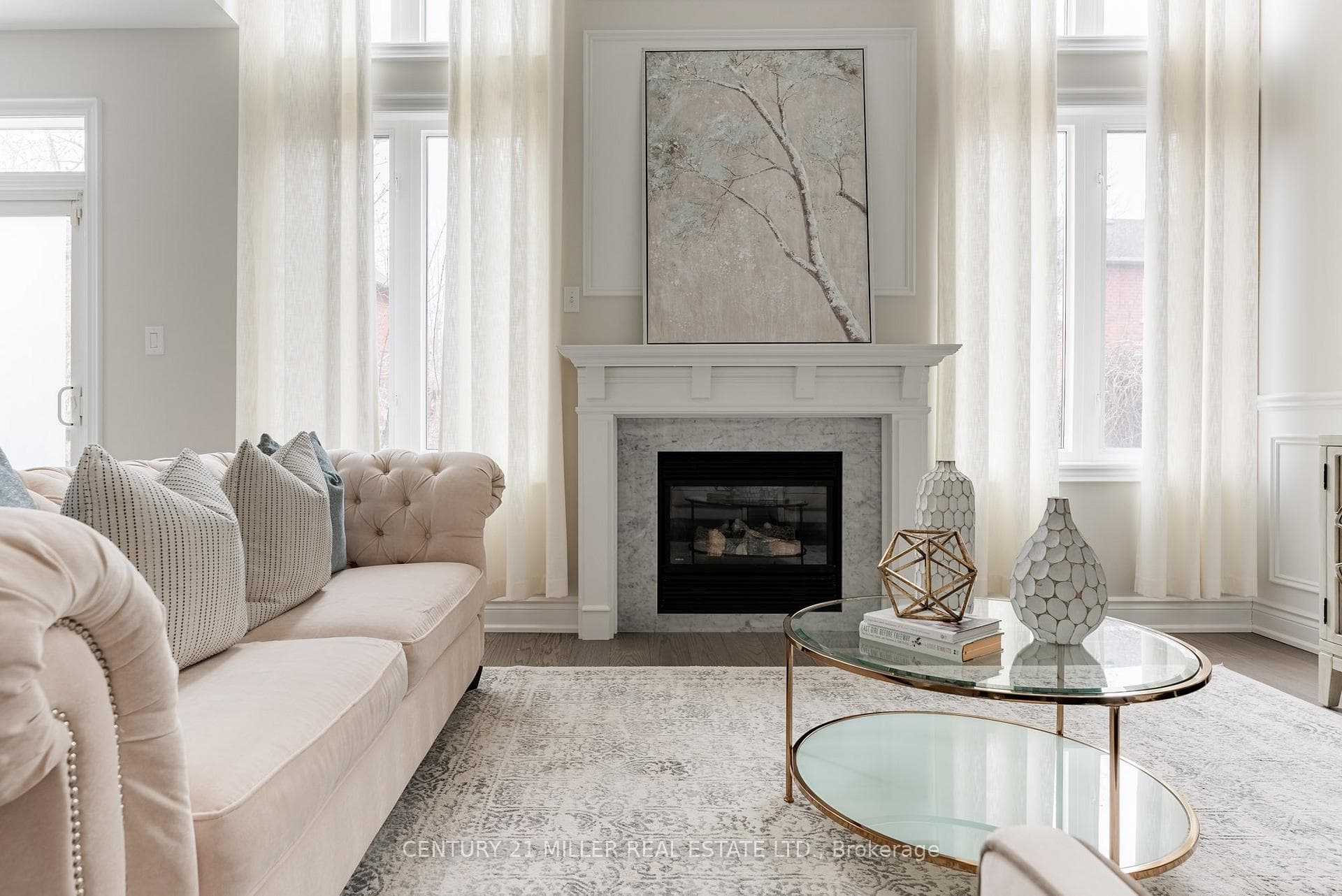 Family room with marble surround fireplace
