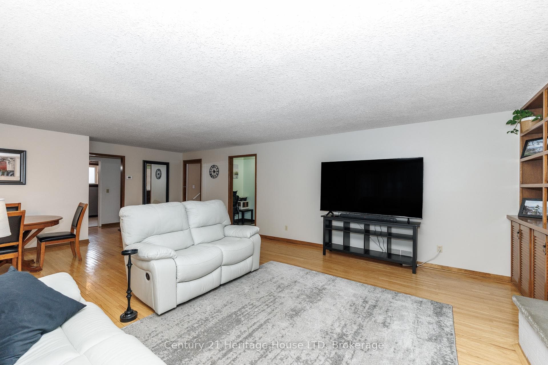 Living room with gleaming hardwood