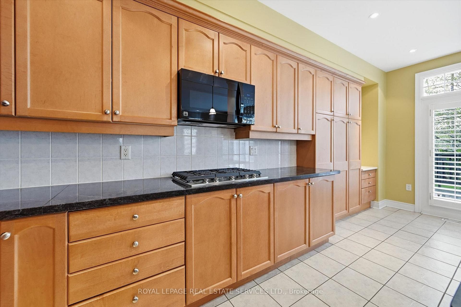 Kitchen w/Granite Counters & Built-In Appliances
