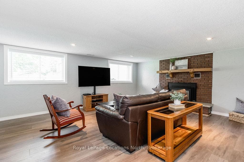 Lower Level Family Room with Gas Fireplac