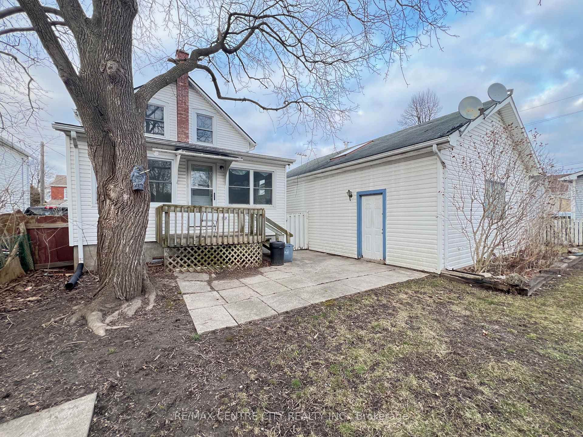 REAR EXTERIOR HOUSE & GARAGE