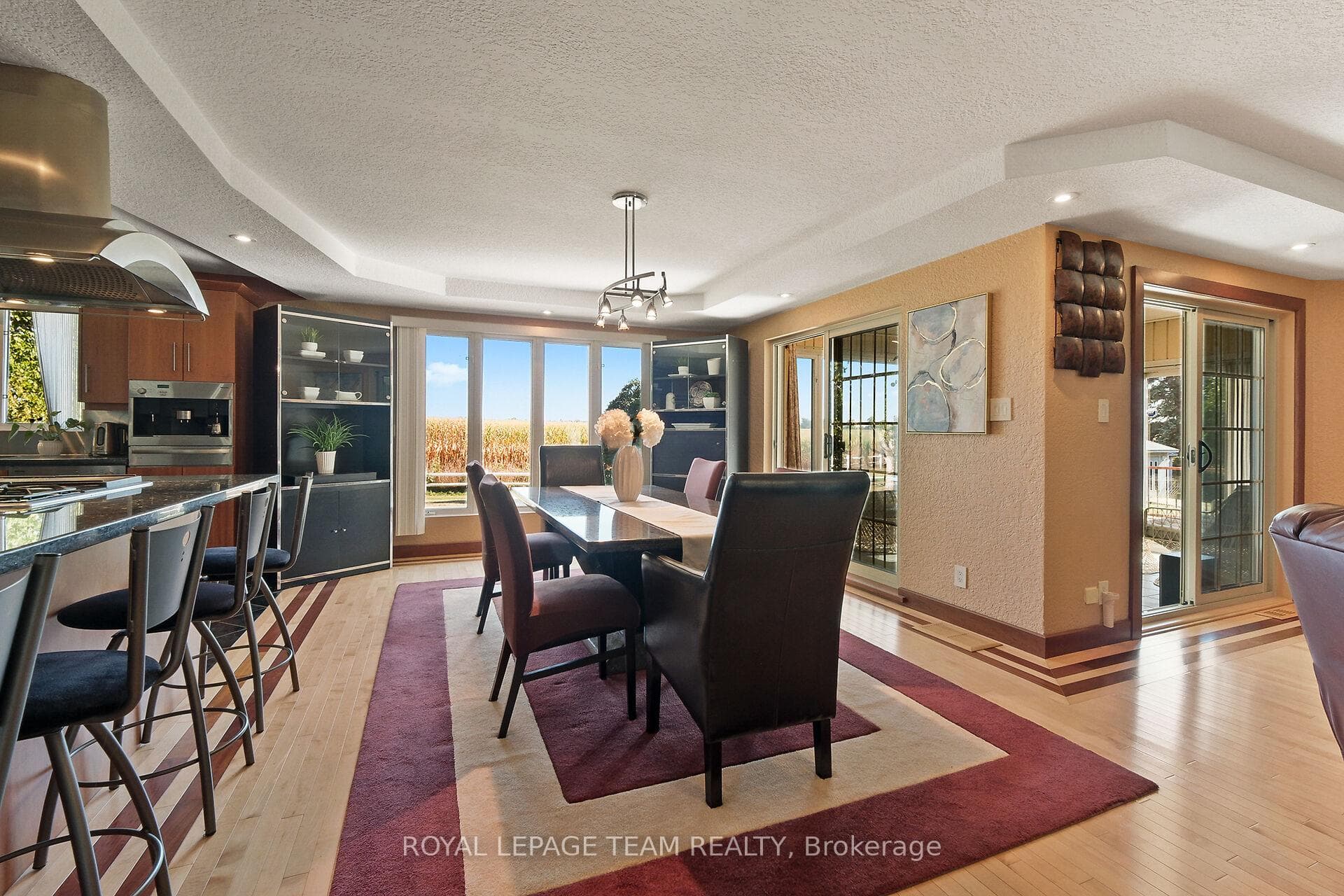 Sprawling country views, access to sunroom & deck.