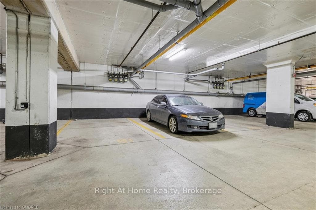 2 underground parking spots, side by side