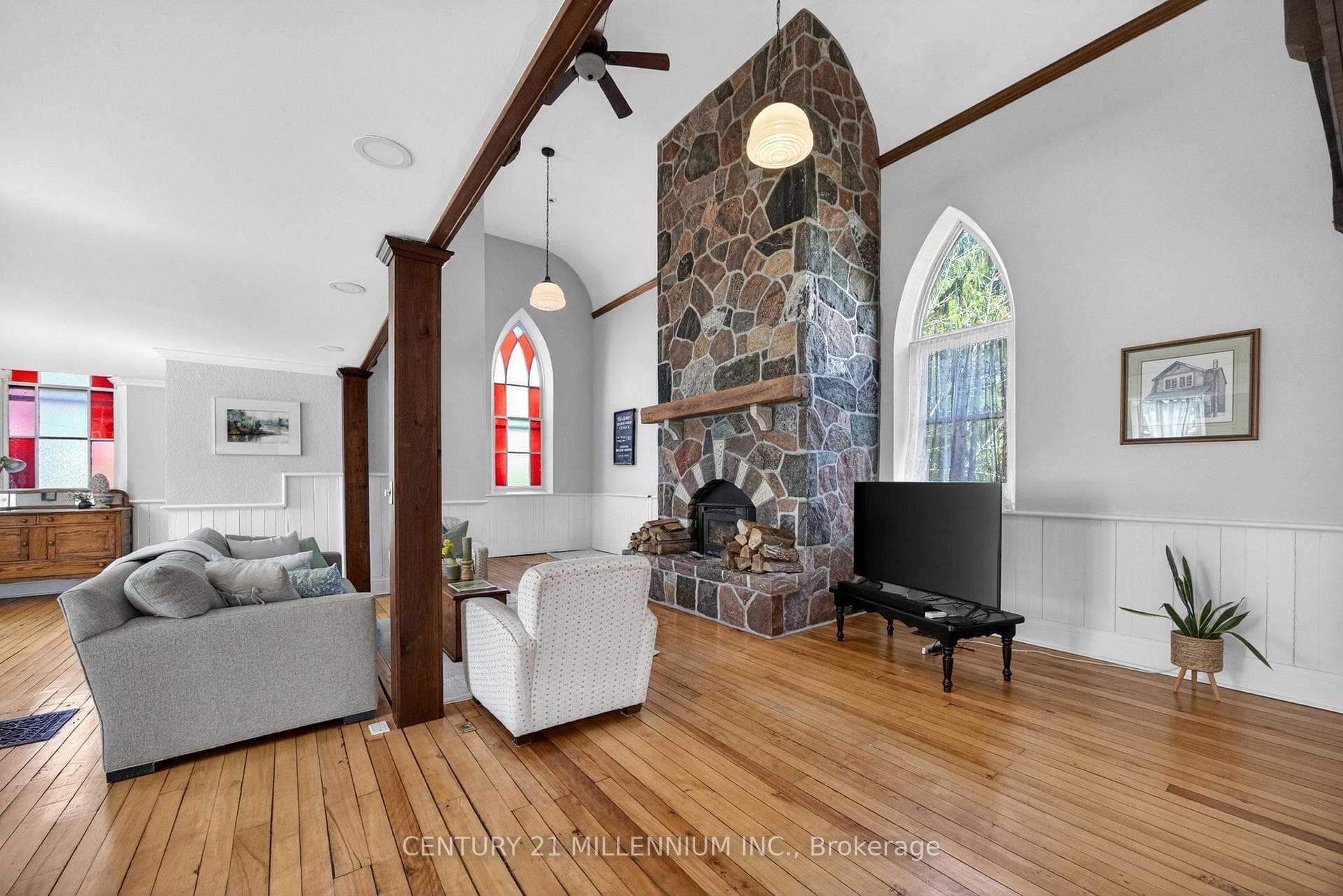 17 foot high granite fireplace & hardwood floors