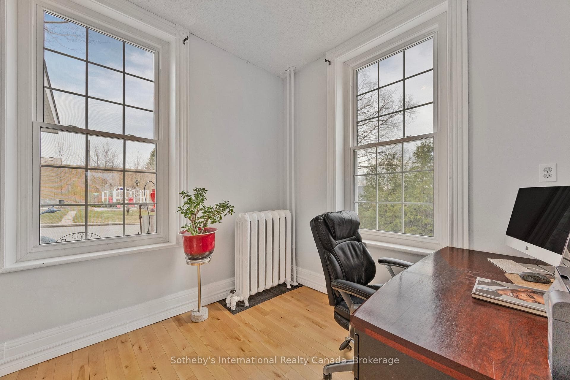 Office/Den on main floor, bright with large window