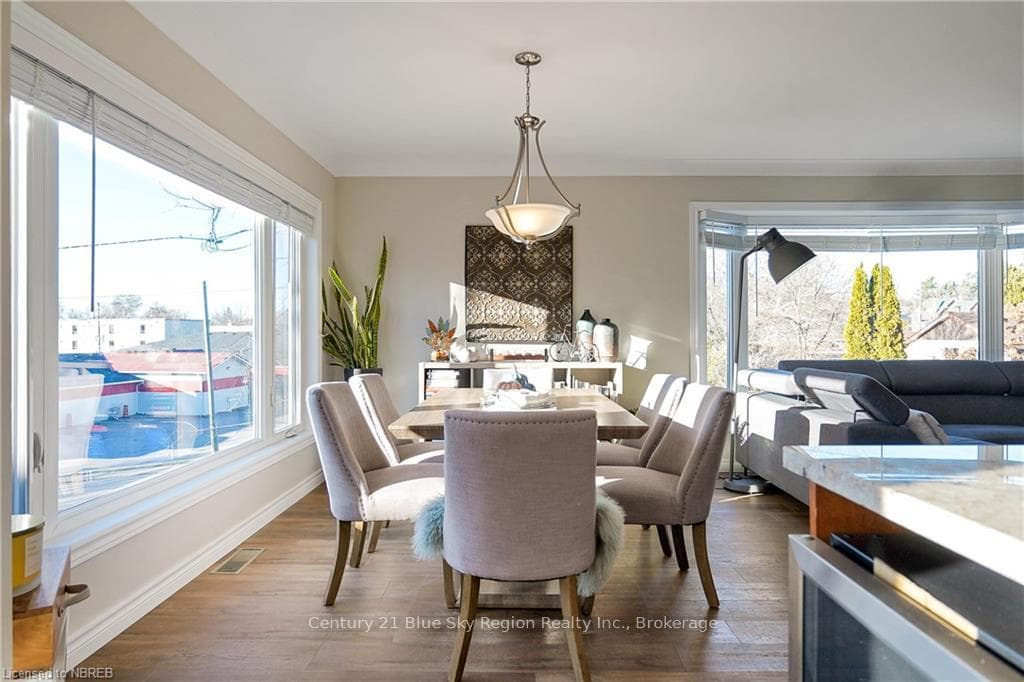 Dining room featuring dark hardwood / wood-style f