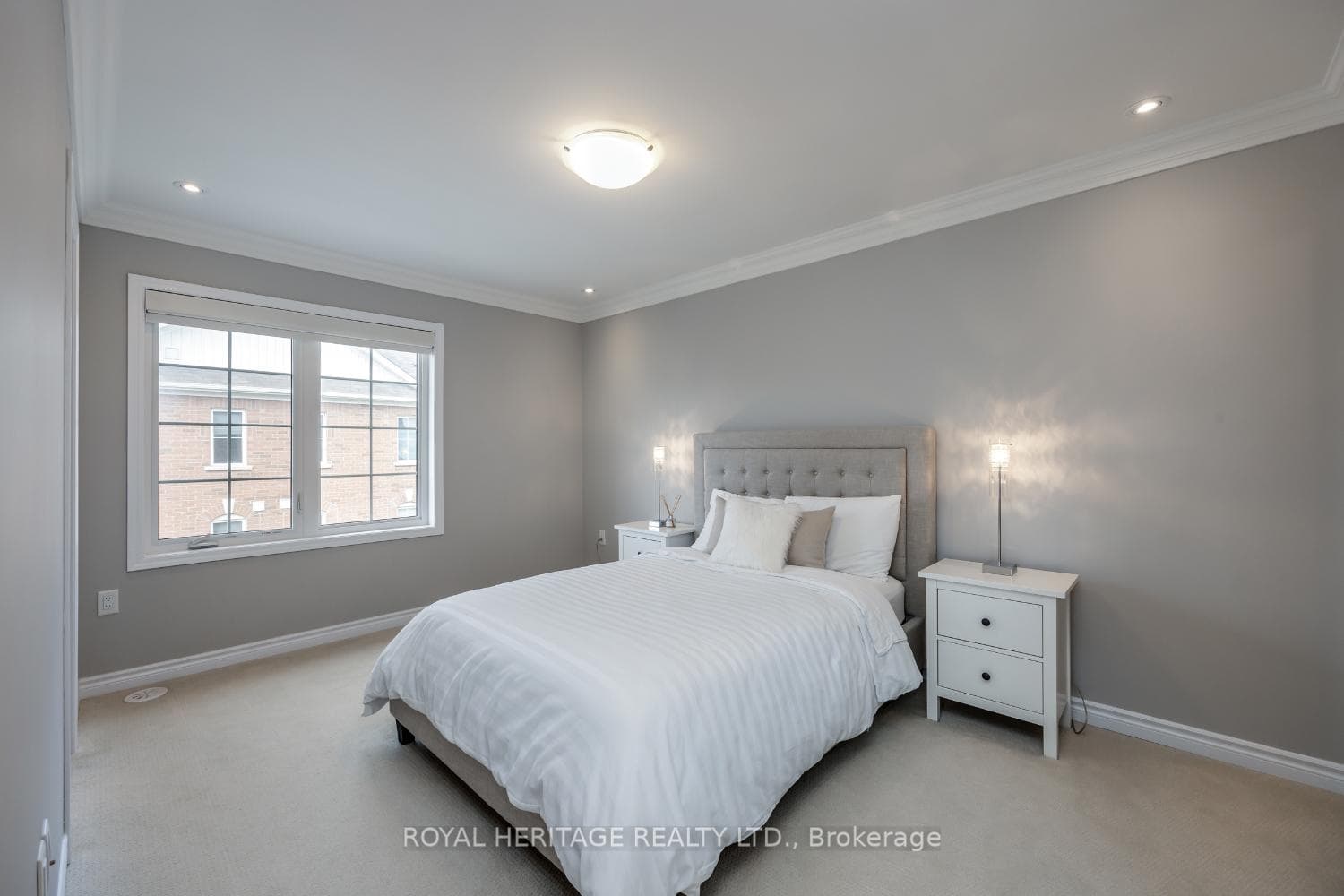 Primary Bedroom With Crown Moulding