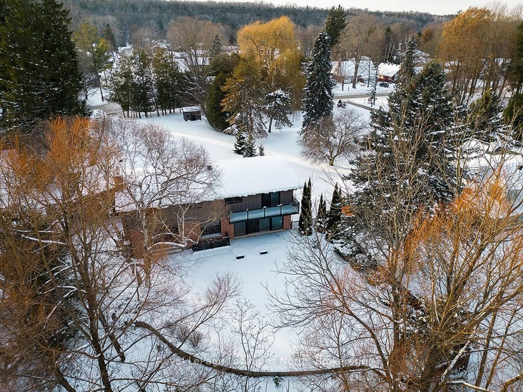 Aerial Backyard Views With A Blanket Of Snow