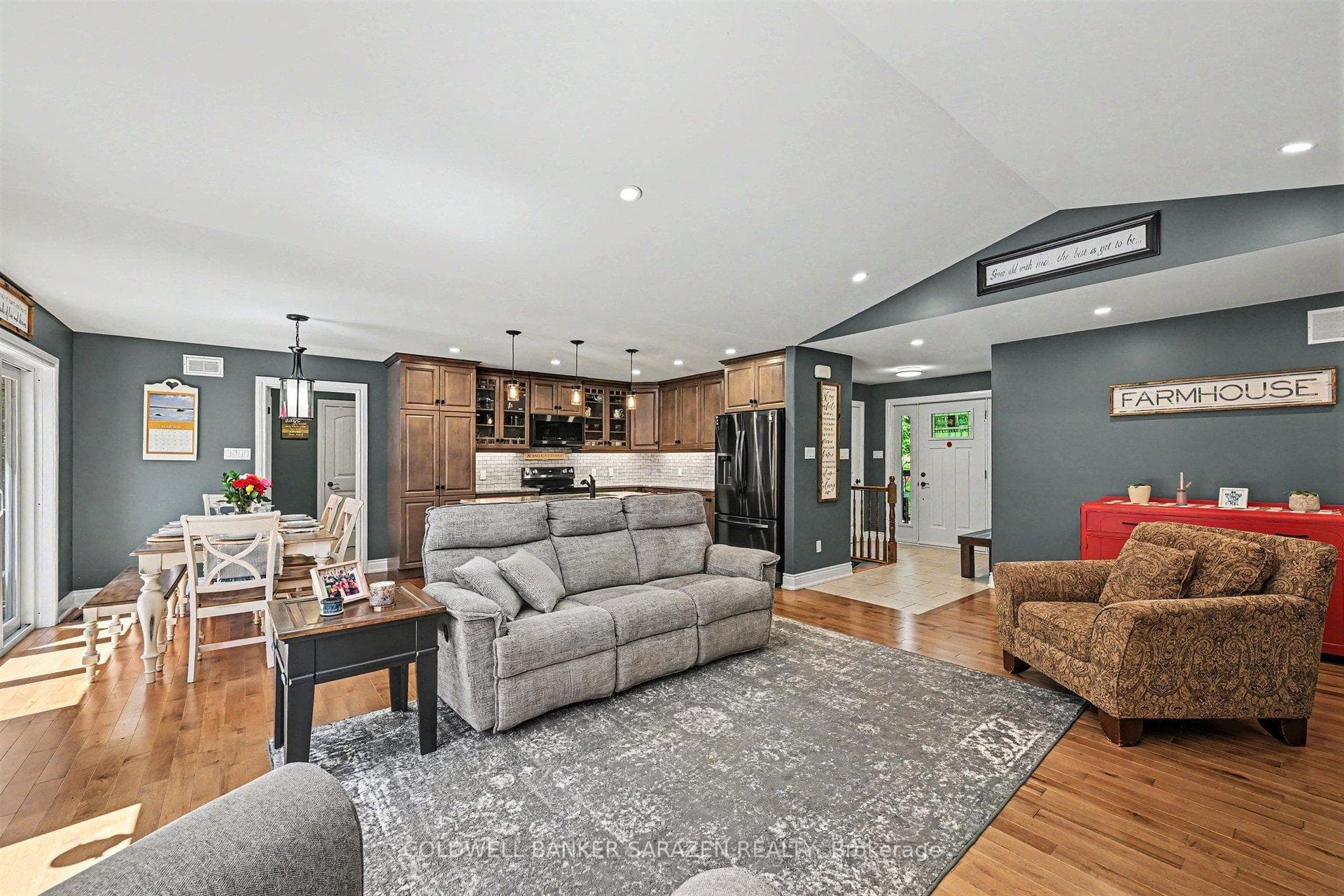 Living room area has a cathedral ceiling
