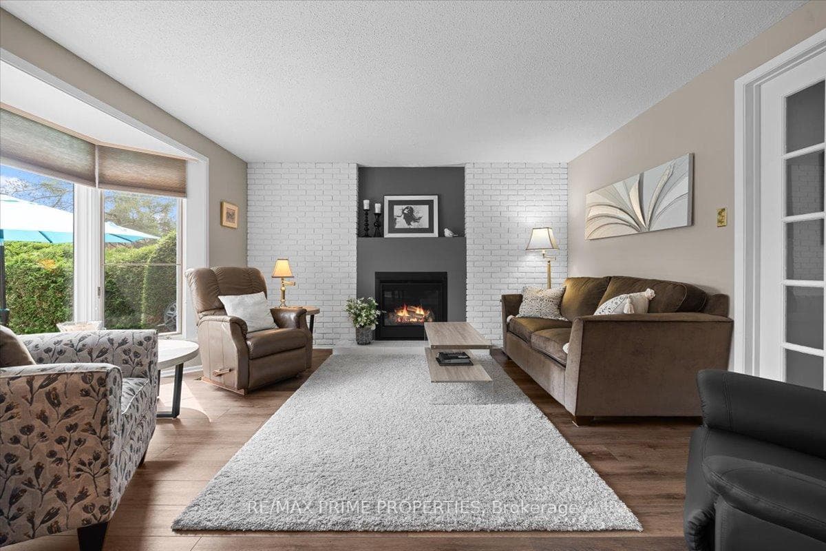 Gas fireplace with brick accent wall