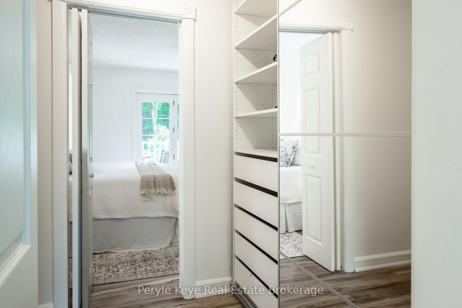 Primary Bedroom Walk-through Closet