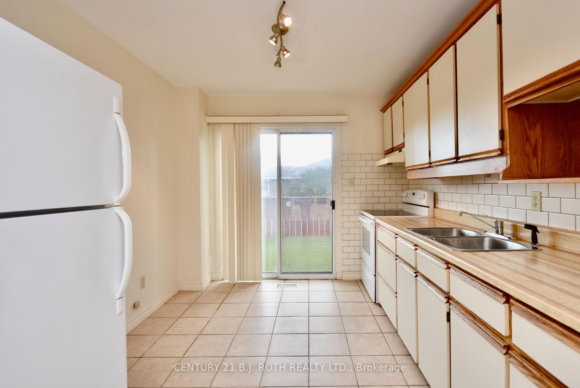 Kitchen with walk out to deck