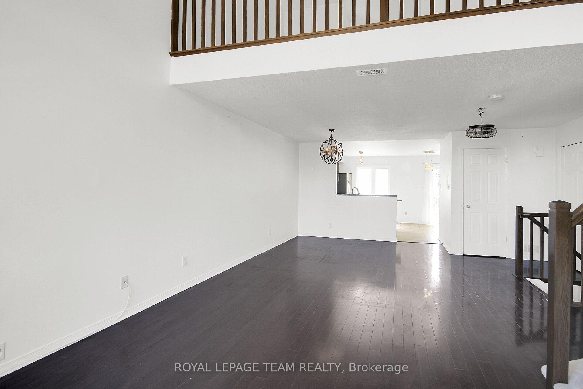 HDW floors in Living/Dining Rm on Upper Level.