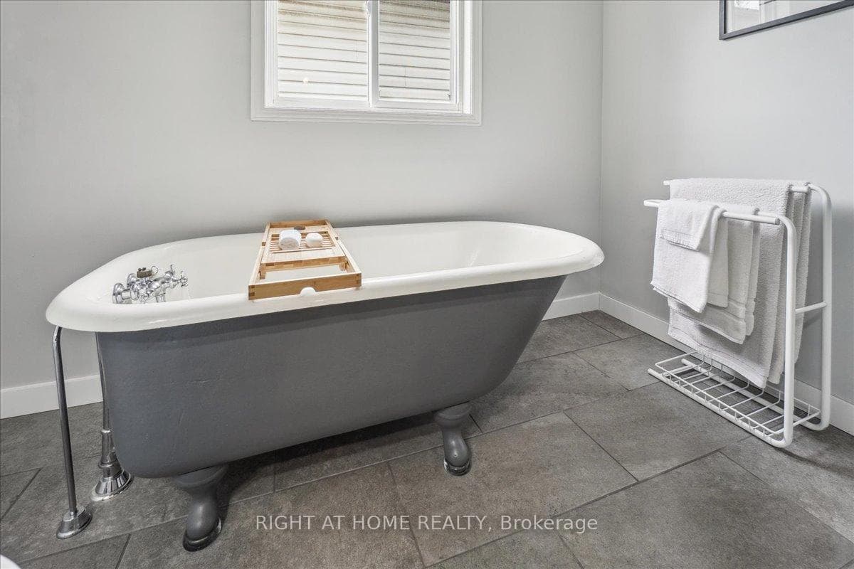 Claw foot tub in second floor bathroom