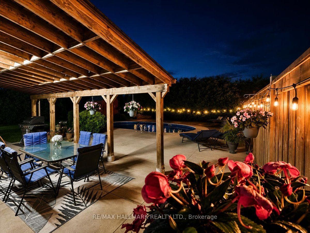 Covered living/dining spaces with warm lighting