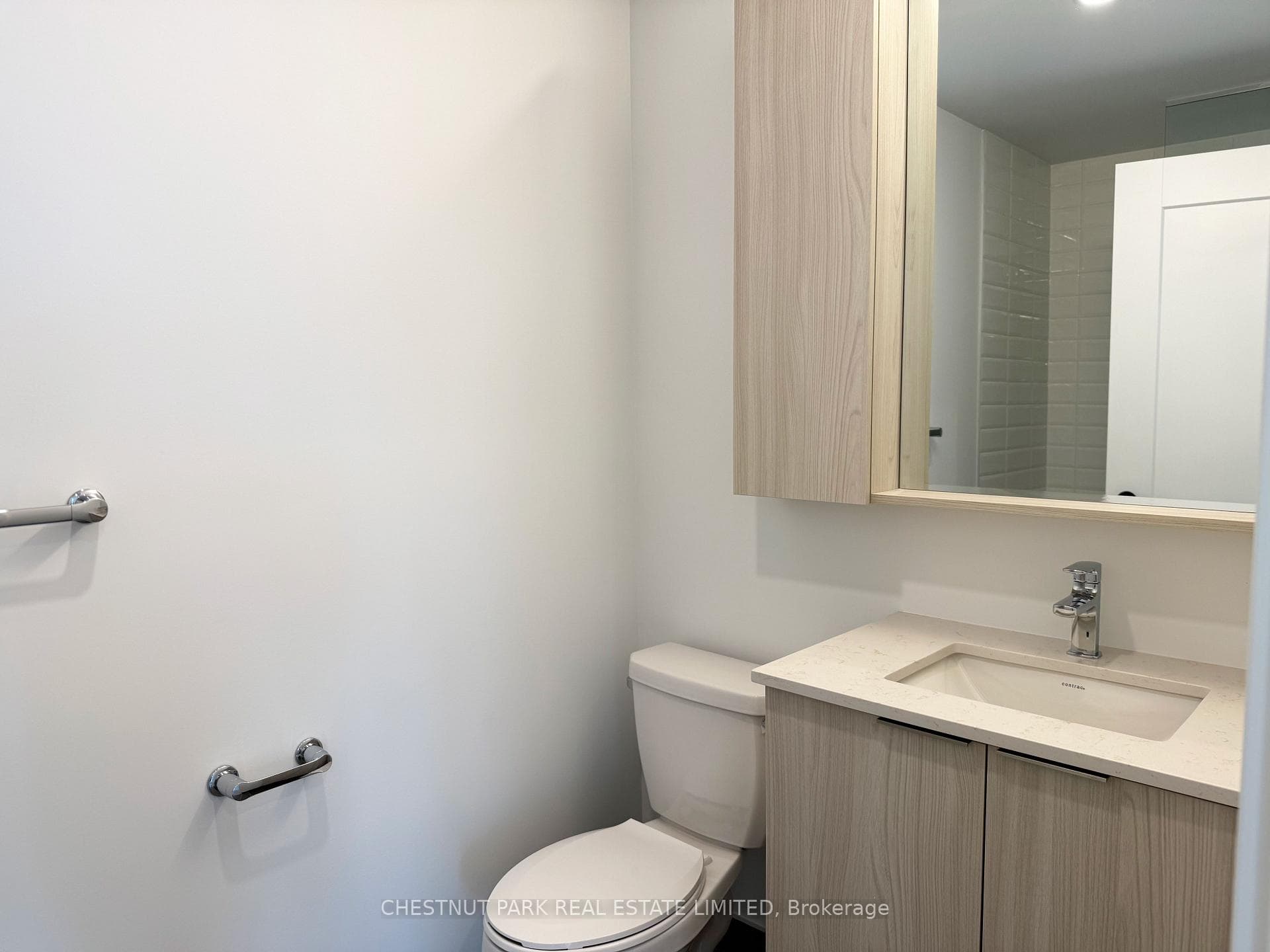Main bathroom features medicine cabinet