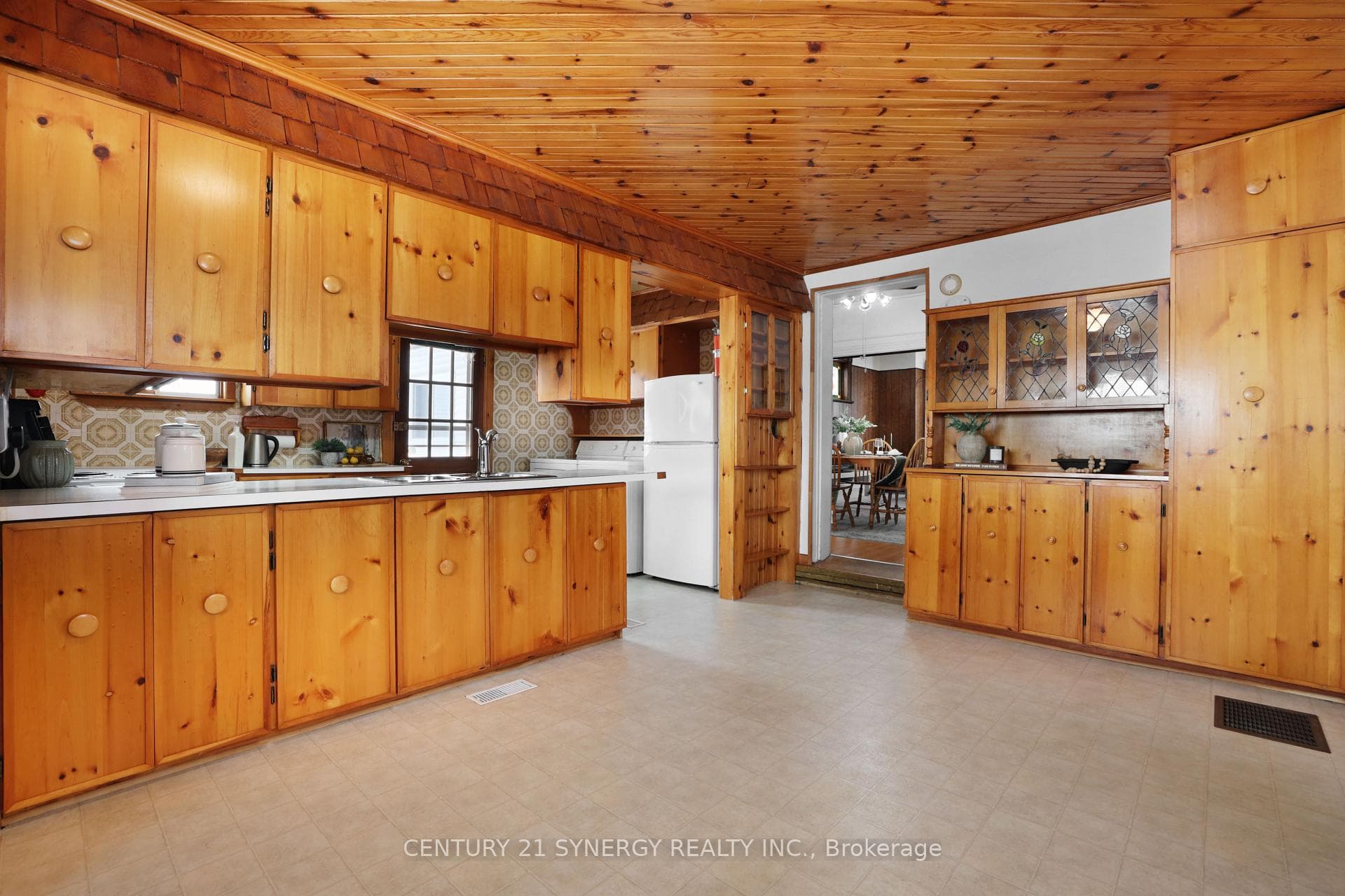 Mid-century kitchen w/tongue and groove ceiling.