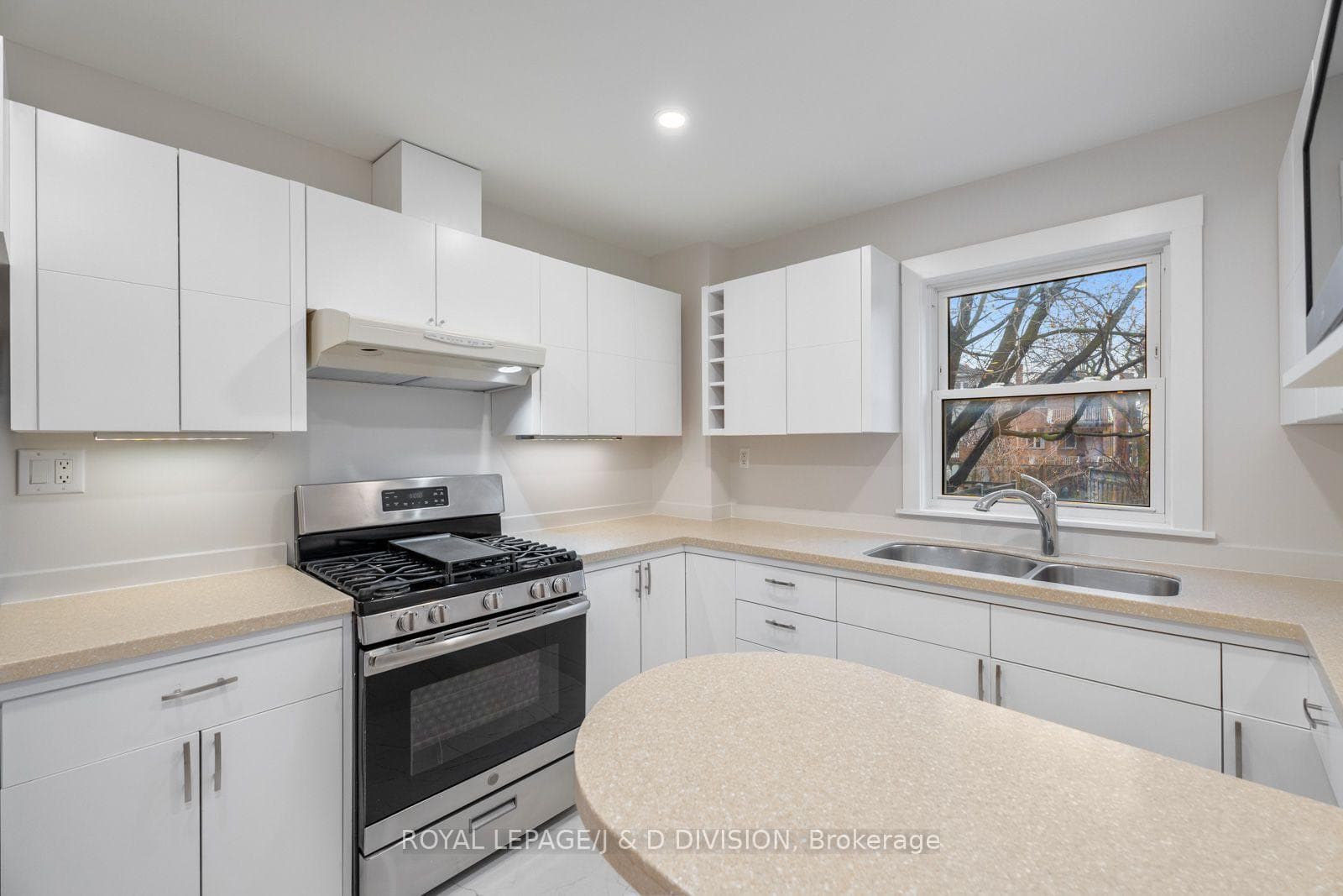 Kitchen w window overlooking back yard