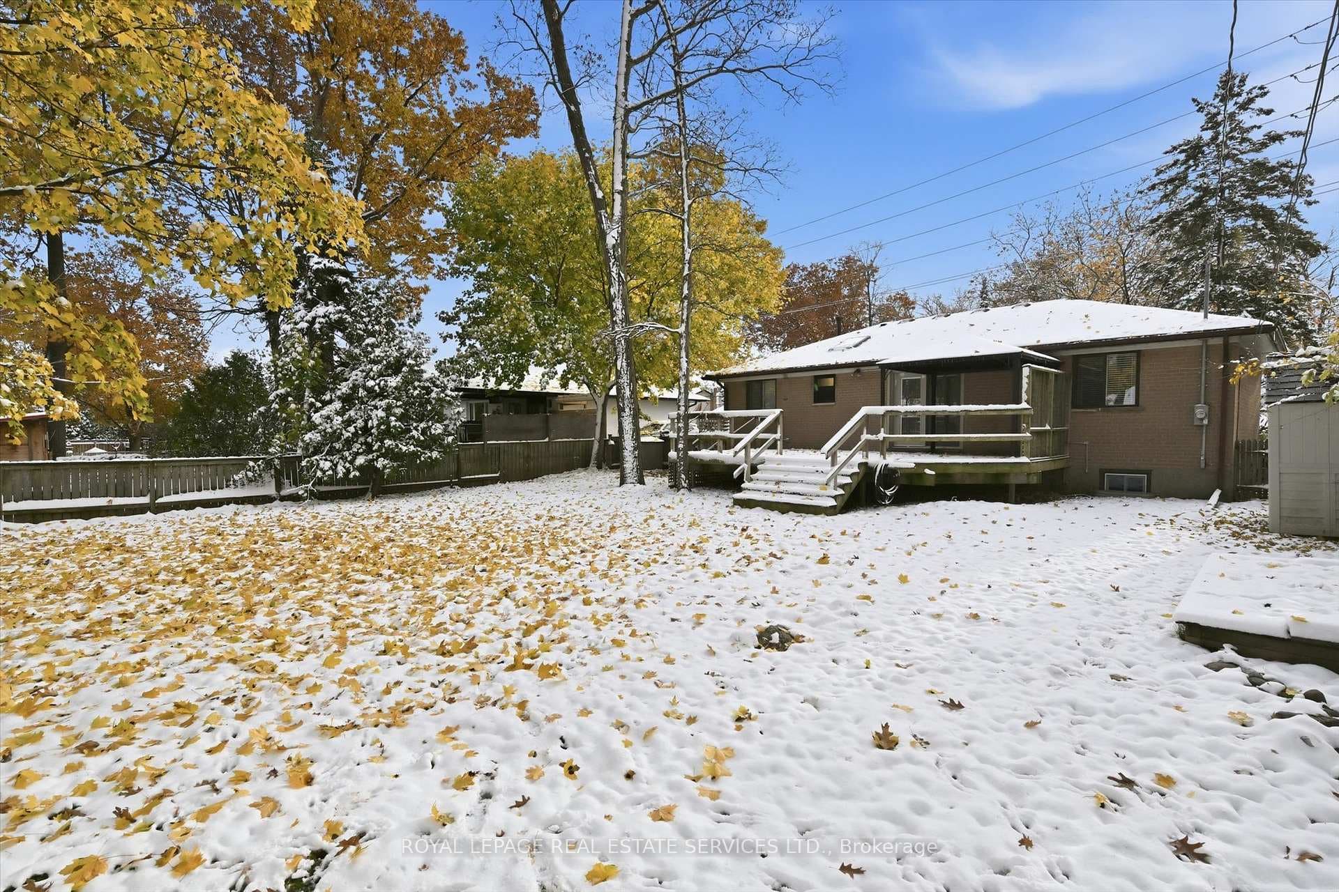 Shared Backyard Offers an Expansive Deck w/Cabana