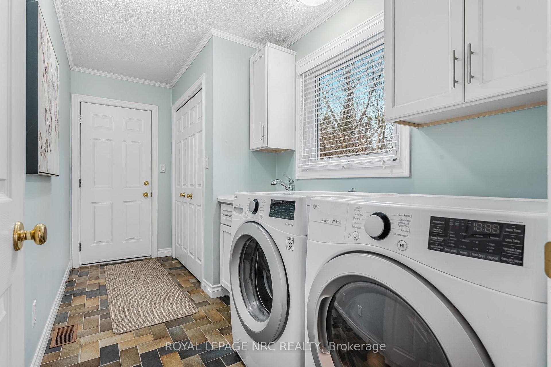 Main floor laundry/mud room off kitchen.