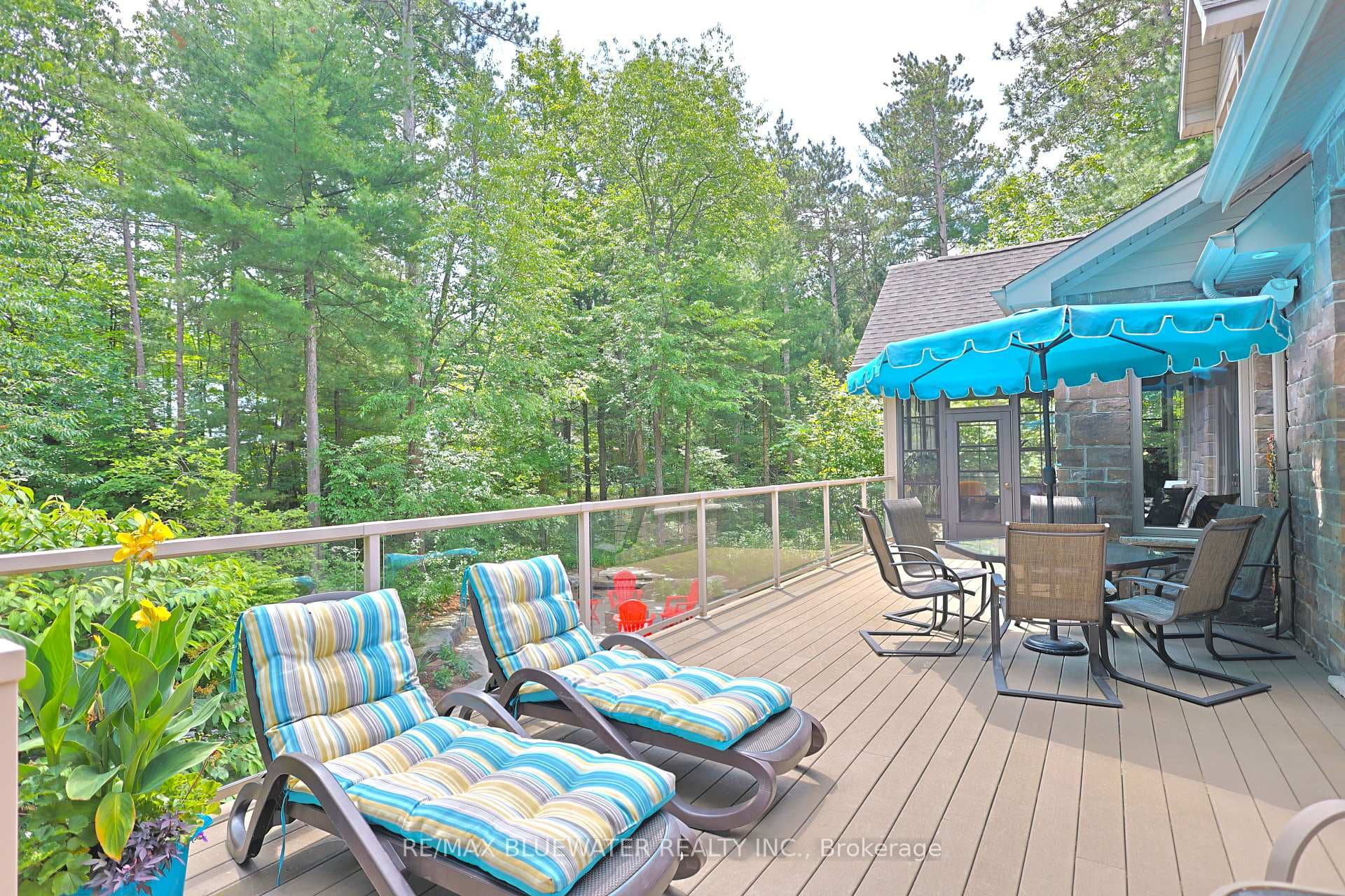 Spacious Composite deck With Glass Railings