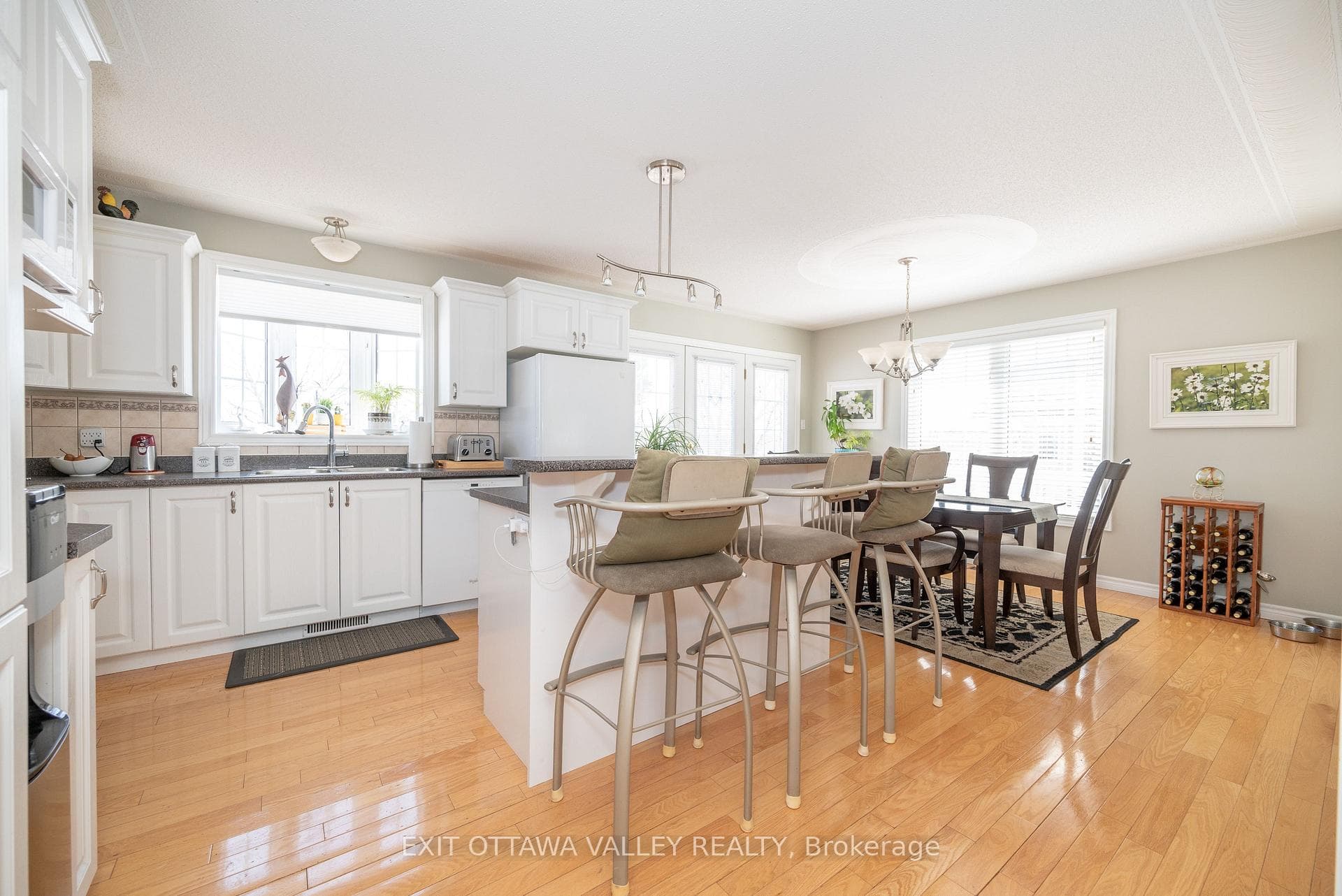 Sun filled kitchen island with breakfast bar.