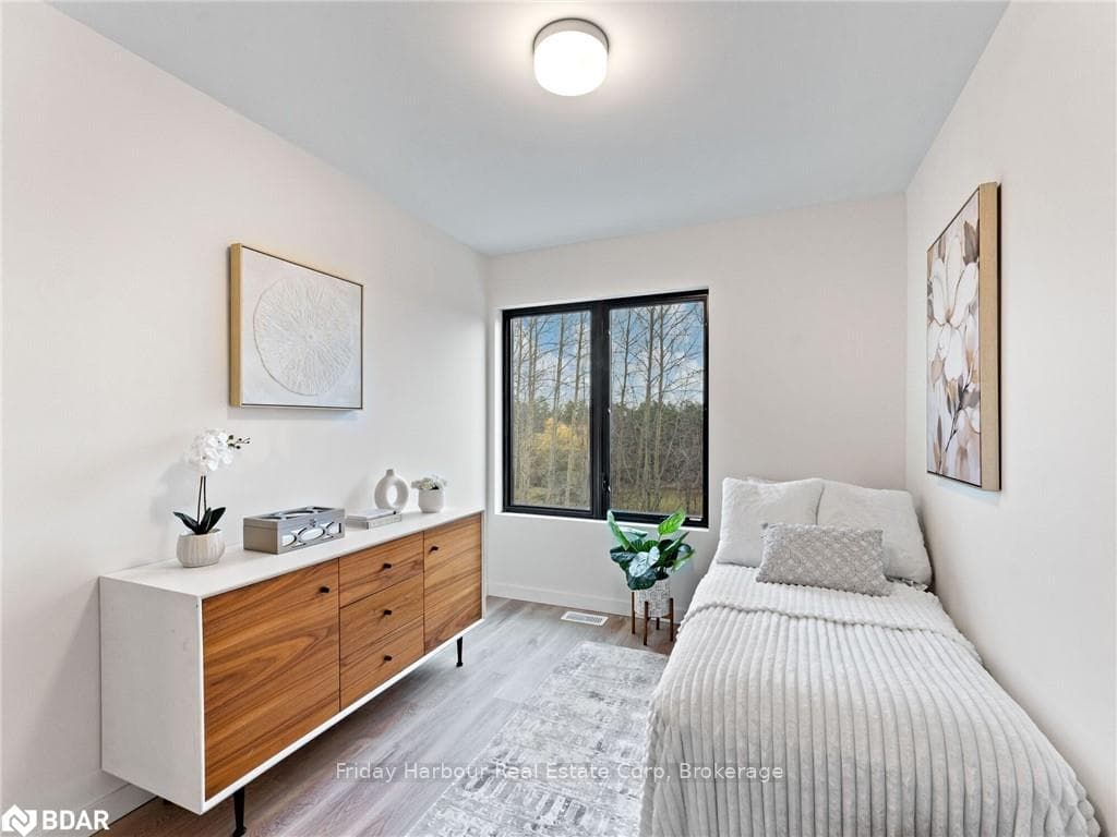 Bedroom featuring hardwood / wood-style floors