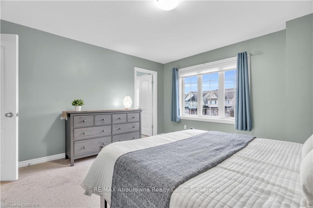 primary bedroom with ensuite and walk in closet