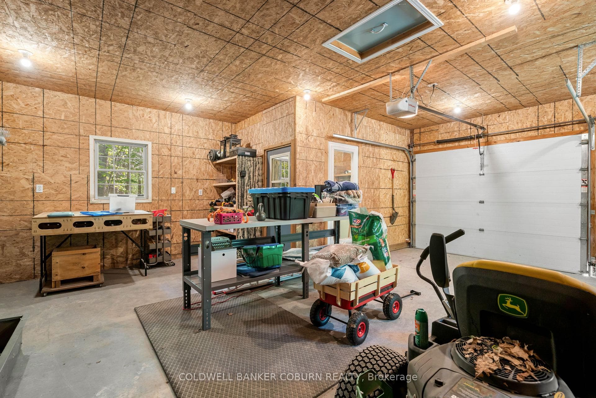 Interior detached garage; sectioned off workshop
