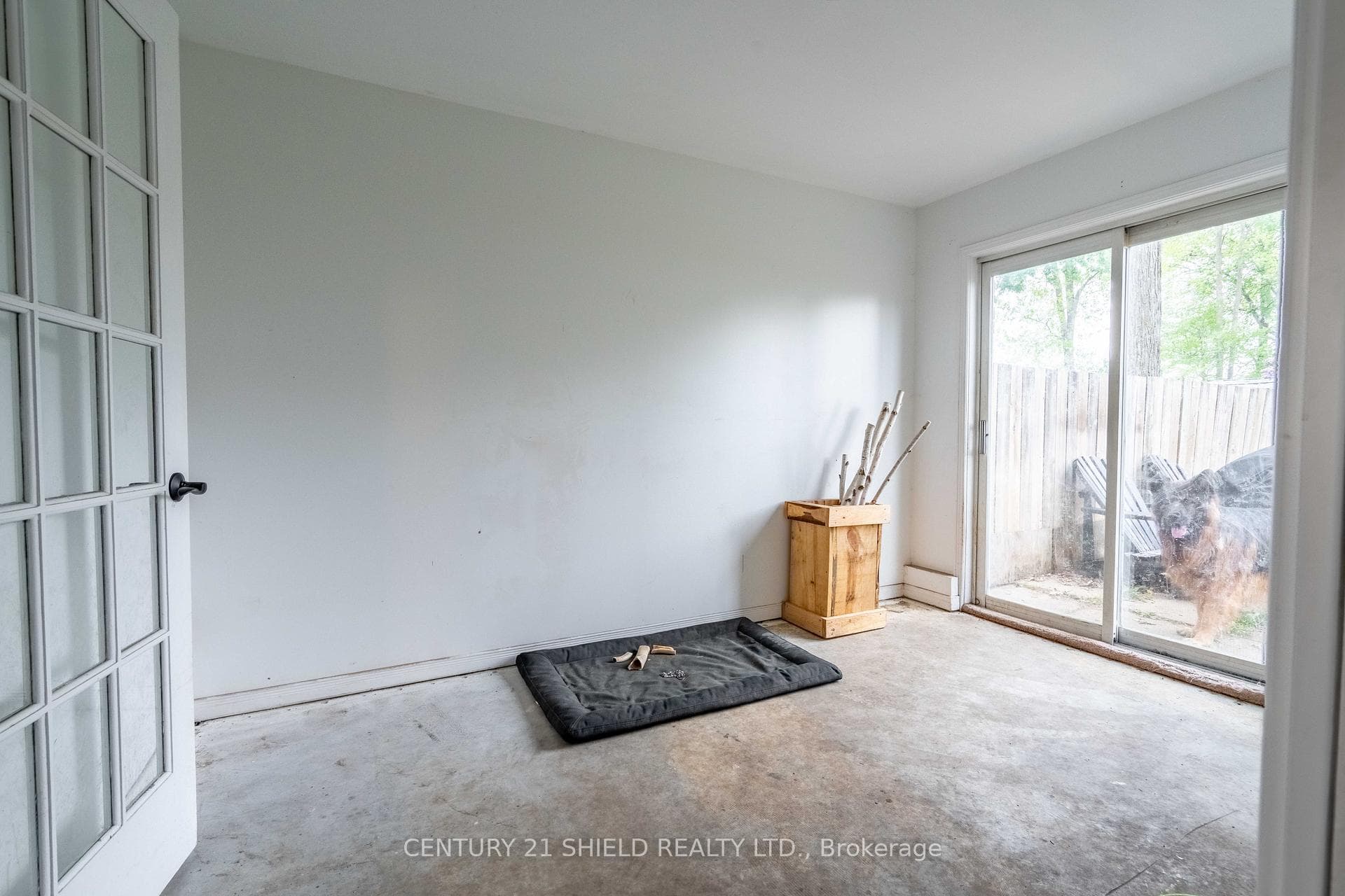 Bonus room with patio doors to fenced back yard